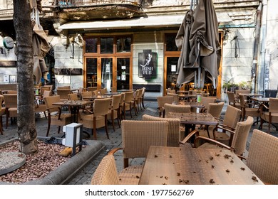 Belgrade, Serbia - March 23, 2021: Empty Tables And Chairs. Closed Irish Pub In Belgrade Due To Coronavirus Quarantine, COVID-19