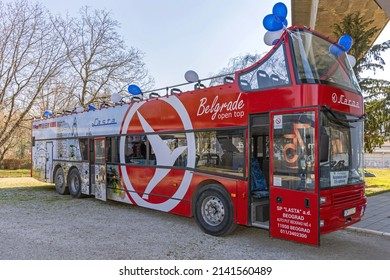 Belgrade, Serbia - March 24, 2022: Open Top Convertible Long Tourists Bus Lasta Decorated With Balloons..