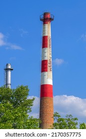 Belgrade, Serbia - May 14, 2022: Tall Chimney Smurfit Kappa At Paper Factory Building.