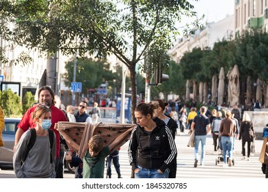 BELGRADE, SERBIA - OCTOBER 10, 2020: Family, A Mother, Woman, And Her Son, Boy, Walking Wearing With Only One Person Wearing Face Mask Protective Equipement On Coronavirus Covid 19 Crisis.

