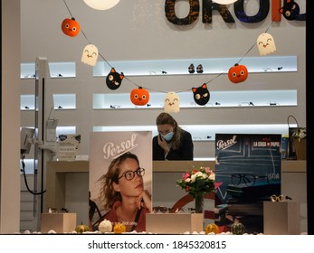 BELGRADE, SERBIA - OCTOBER 14, 2020: Woman, Staff Emplyee Worker Wearing A Respiratory Face Mask In An Optician Store In Belgrade, During The Coronavirus Covid 19 Health Crisis.

