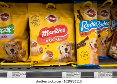 BELGRADE, SERBIA - SEPTEMBER 10, 2020: Pedigree petfoods logo on a bag of dog food for sale in belgrade. Pedigree Petfoods is an American brand of pet feed and supplies part of Mars group.

