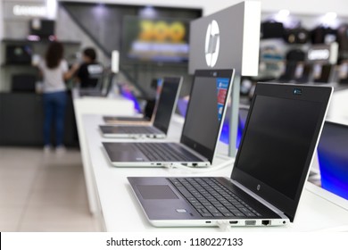 Belgrade, Serbia - September 13, 2018: New HP Laptop Computers With Blank Screen Are Displayed On White Table In Electronic Store.