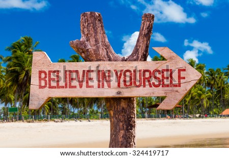 Believe in Yourself arrow with beach background