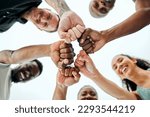 Believe in yourself and you could do it. Shot of a group of friends fist bumping one another before a workout.