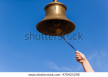 Bell Hand Communication 
Hand Brass bell closeup ringing communication sound notice tool object.