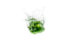 Bell Peppers Falling Into The Splash Water,Vegetable