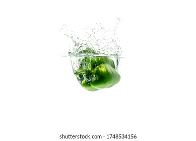 bell peppers falling into the splash water,Vegetable