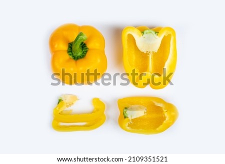  Yellow bell peppers sliced(capsicum) on a white background