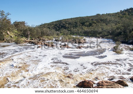 The Bell Rapids white water where the Avon and Swan River meet in Brigadoon in the Swan Valley region in Western Australia/Flowing Bell Rapids/Brigadoon, Swan Valley Region, Western Australia