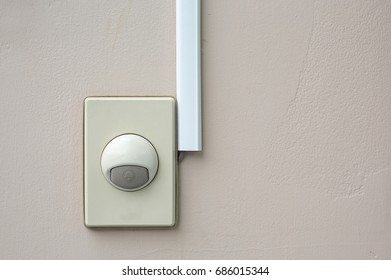 Bell switch button on the wall with copy space