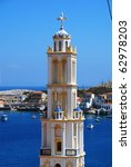 The bell tower of the Agios Nikolaos church at Emborio on the Greek island of Halki. The tower is the tallest in the Dodecanese islands.