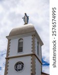 Bell tower and clock of the Church of the Immaculate Conception built in 1855 by the Marist Fathers in Mont-Dore, Noumea, Grande Terre Island, New Caledonia