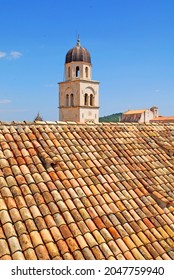 Bell Tower And Detail Of The Roofs Of The Franciscan Monastery, Order Of Friars Minor In The City Of Dubrovnik, Croatia.