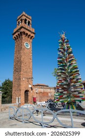 Bell Tower And Murano Glass Tree Sculpture In Murano In Venice,Italy,2019,march