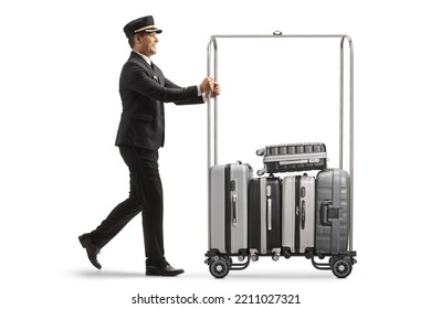 Bellboy Pushing Suitcases On A Hotel Luggage Cart Isolated On White Background