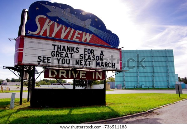 Belleville, IL—October 17, 2017 Drive in\
movie theater posts end of season sign on Marquee\
