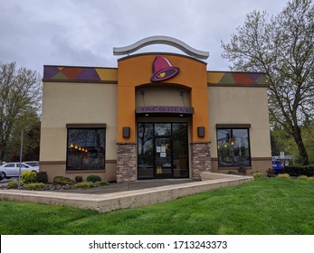 Bellevue, WA / USA - Circa April 2020: Exterior View Of A Taco Bell Fast Food Restaurant While The Dining Room Is Closed Due To COVID-19.