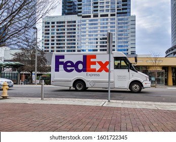 Bellevue, WA / USA - Circa December 2019: Street View Of An Empty FedEx Mail Delivery Truck Parked By The Curb In Downtown Bellevue.