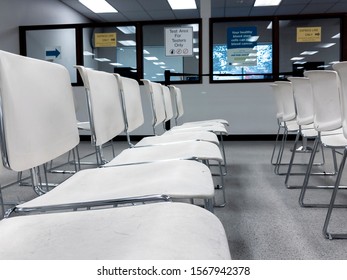 Bellevue, WA / USA - Circa November 2019: Bellevue DMV Waiting Room With White Chairs, Nobody Is Around.