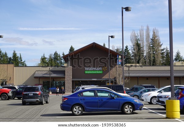 Bellevue,\
WA, USA - March 10, 2021: Walmart store exterior. Walmart is an\
American multinational corporation that runs large discount stores\
and is the world\'s largest public\
corporation.