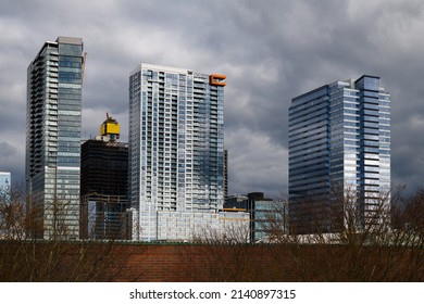 Bellevue, WA, USA - March 29, 2022; Ominous Dark Clouds Above The Bellevue Washington Skyline Including The W And Westin Hotels
