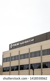 Bellevue, Washington / USA - April 25 2019: Overlake Hospital Medical Center Sign At The Emergency Room And Treatment Center In Downtown Bellevue, With Space For Text On Top And Bottom