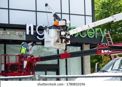 Bellevue, Washington / USA - July 8 2020: Construction Crew Installing An 