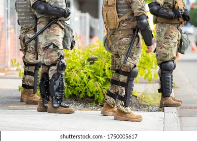 Bellevue, Washington / USA - June 1 2020: Faceless National Guard soldiers wearing body riot gear 