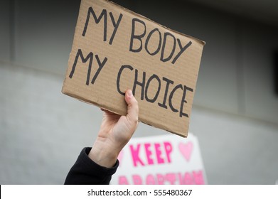 BELLINGHAM, WASHINGTON, USA - November 20, 2015: A hand holding a a pro choice sign during a demonstration in support of Planned Parenthood after the election.