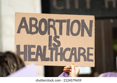 BELLINGHAM, WASHINGTON, USA - October 2, 2021: A Hand Holding A Sign Supporting Abortion As Healthcare During A Rally For Abortion Justice.