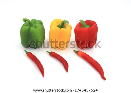 bellpepper and redchilli on white background