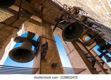 The bells of the Giralda Tower seen up close at the Great Cathedral of Seville, Spain.