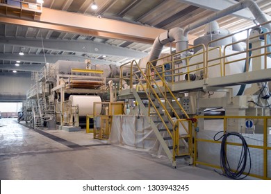 BELLUNO, ITALY - February 27, 2017 - This Paper Mill Is A Factory Devoted To Making Paper And Coated Cardboard From Recycled Paper Using This Fourdrinier Machine.