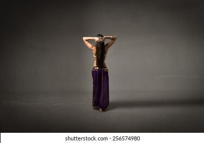 belly dancer in back side position