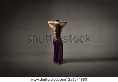 belly dancer in back side position
