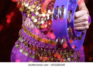 Belly Dancer Close-up With Red Bokeh
