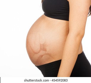 Belly Of A Pregnant Woman With The Fetus In Cephalic Position.