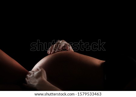 Similar – Baby sleeping on a blanket while her mother looks