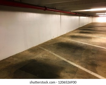 A Below Grade Parking Garage Early In The Morning.