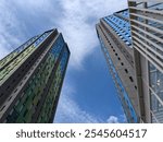 A Below View of Two Tall Modern Skyscrapers in Bogota Colombia 