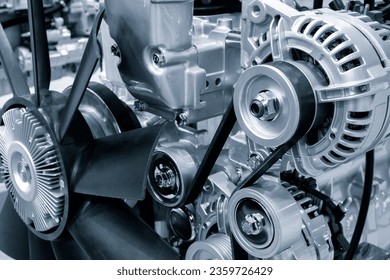 Belt drive of Diesel engine electric generator. Close up car timing belt. Belt transmission close up. industrial technology concept background - Powered by Shutterstock