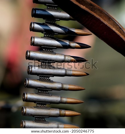 Belts and clips of machine gun bullets.