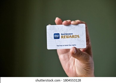 BEMIDJI, MN - 20 JUL 2020: Womans Hand Holding Room Security Keycard For Best Western Hotels Brand In Close-up View.