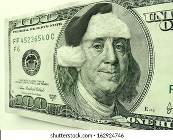 Ben Franklin Is In The Christmas Spirit For The Holiday's Wearing A Santa Hat And A Smile.