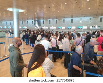 BEN GURION AIRPORT, TEL AVIV, ISRAEL. May 20, 2022. Huge Crowds Of Israeli Passengers Standing In Life For Check In For Outbound Flights. Long Lines Come Due To The Shortage Of Airport Staff.