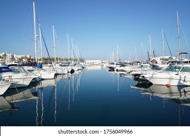 Benalmadena, Spain - January 6 2020: The beautiful marina with luxury yachts and motor boats in Puerto Marina in Benalmadena