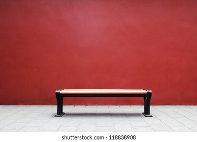 Bench In The Forbidden City With Red Wall