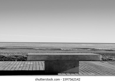 Bench in front of beach