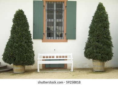 Bench in front of windows